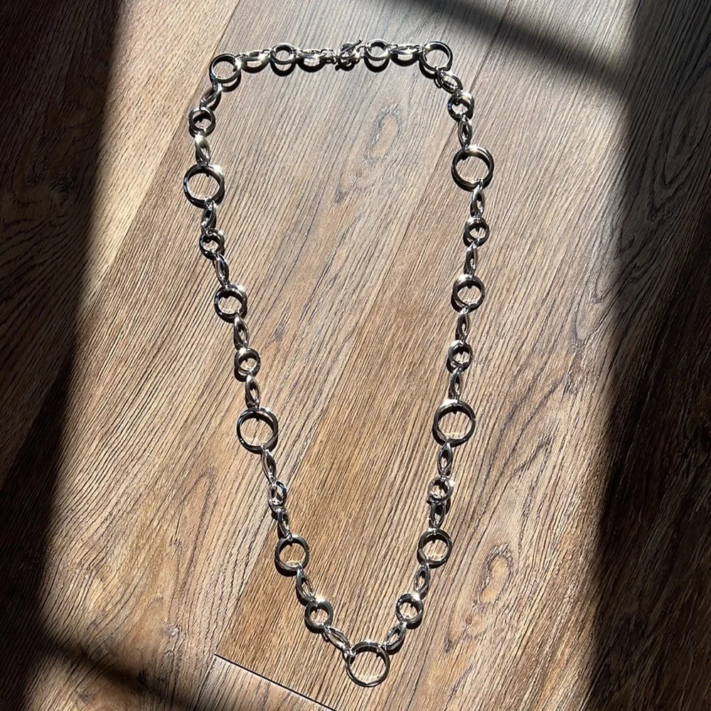 Flat satin finish circles linked together and finished off with a stylish toggle